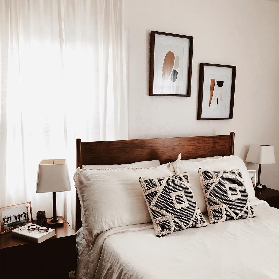A Bed With White Sheets And Two Framed Pictures On The Wall pertaining to Alton Cherry Ii Queen Wood Platform Bed &amp; Headboard 3 Piece Bedroom Set With 2 Nightstands