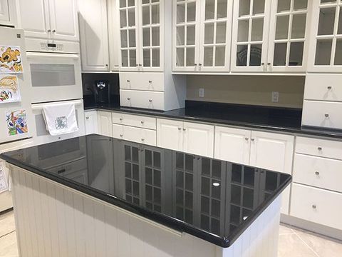 Kitchen Island With A Granite Countertop Absolute-Black--Granite-Island ... in Classic Kitchen Island, Black Granite Top & Large Cabinet With Adjustable Shelf