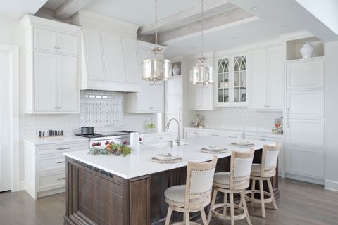 Painted White Kitchen With Dark Wood Island - Crystal Cabinets with From Prep to Presentation Leveraging the Catania Island for Seamless Cooking