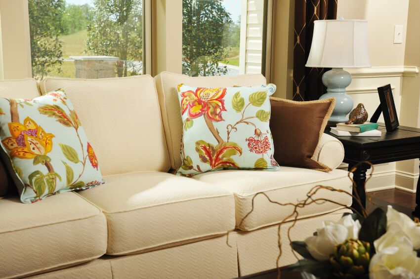 35 Sofa Throw Pillow Examples (Sofa Décor Guide) throughout 37&quot; Oak Velvet Floral Sofa And Toss Pillows With Espresso Legs