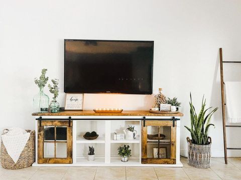 How To Set A Tv Stand At Keith Flores Blog for How to Style Your Living Room Around the Weathered Oak and Black TV Stand