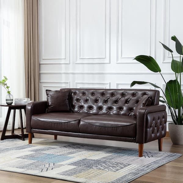The Enduring Appeal of Brown Leather Mid-Century Lounge Sofas