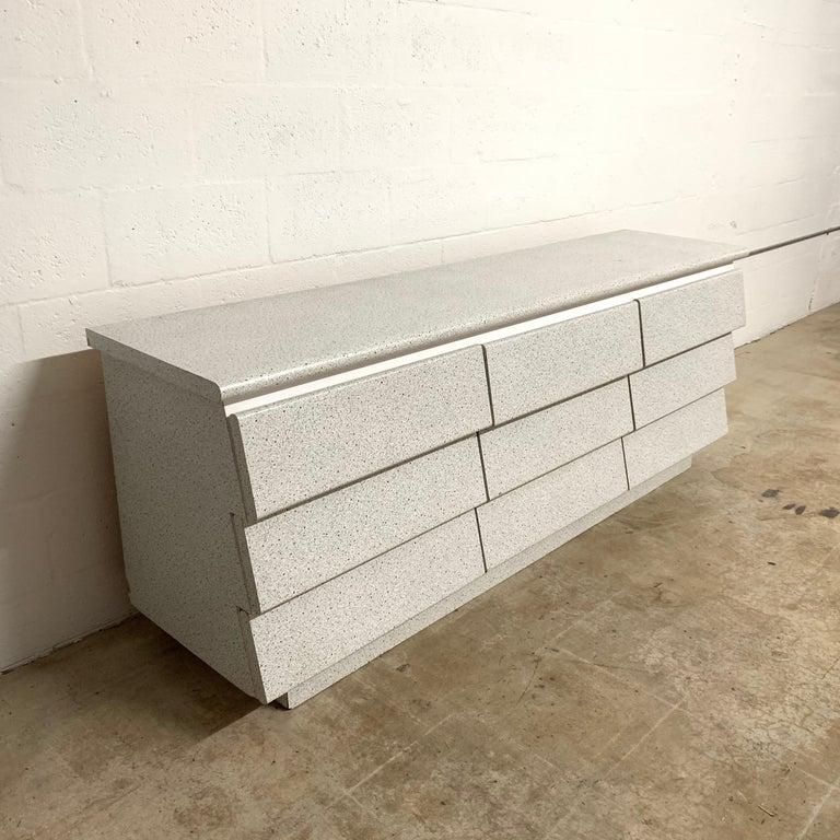 Beyond Storage The Aesthetic Impact of a Granite Top Dresser in Pearl White