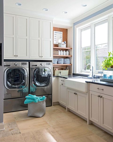 Download A Laundry Room With A Washer And Dryer | Wallpapers.com within