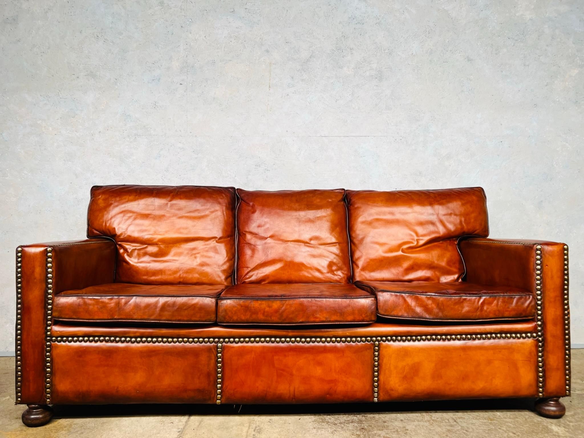 Stunning English Mid C Chestnut Brown Leather Studded Three Seater Sofa ... regarding Weaving Comfort and Style A Chestnut Brown Leather Sofa for Artisans