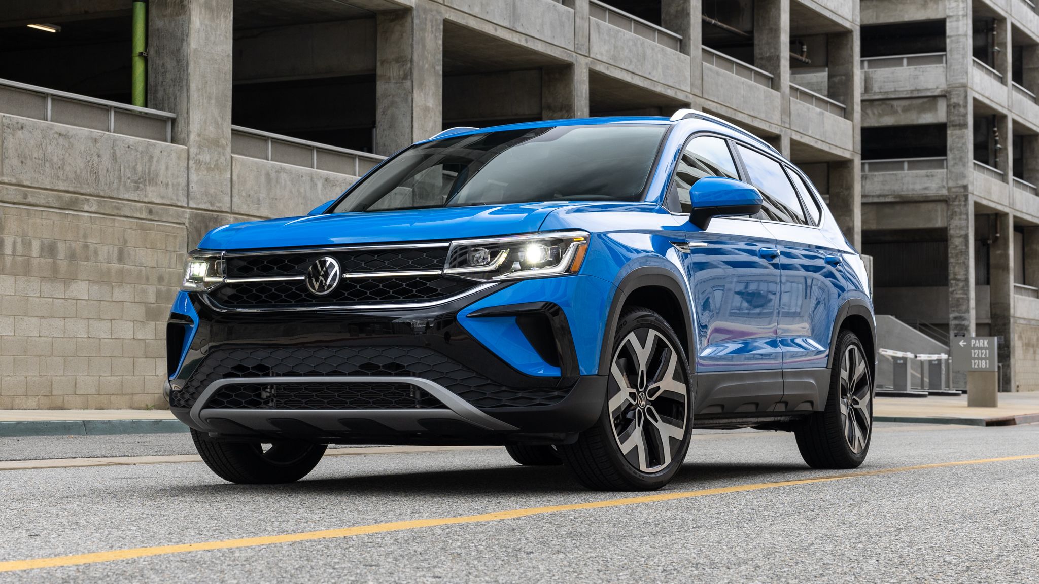 2024 Volkswagen Taos Review: Expert Insights, Pricing, And Trims pertaining to Understanding the Features of the Taos 60&quot; Wide TV Console Canyon Brown