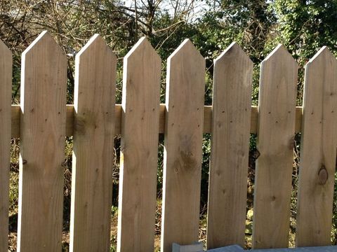 5 Pack 4Ft High Pointed Top Pickets 6" Wide Wood Garden Fence Picket Pales throughout Your Guide to Bedroom Storage Solutions with the Brooks 9-Drawer Dresser