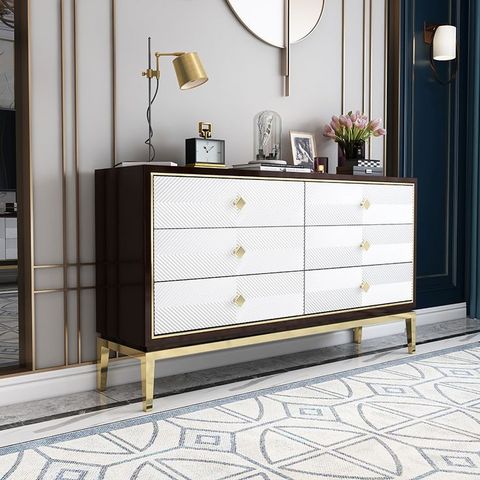 A White And Gold Dresser In A Living Room throughout The Art of Choosing the Right Gloss Finish Dresser for Your Home Décor