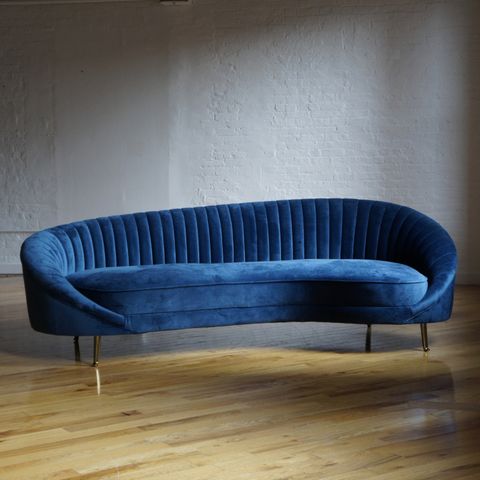 Serpentine Modern Sofa In Blue Velvet - Aptdeco regarding Beyond Aesthetics Understanding the Craftsmanship of Elegant Blue Velvet Sofas