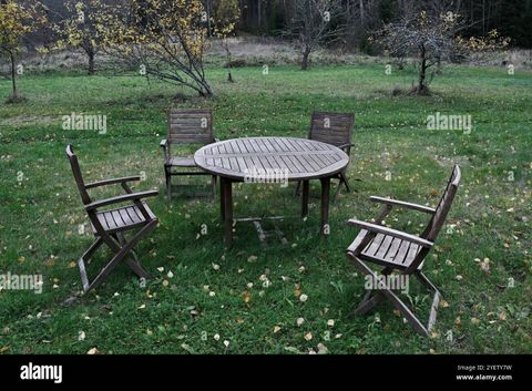 This Image Shows A Rustic Outdoor Seating Arrangement With A Round ... inside Seating In The Round: An Old Idea That’s Still Fresh Today