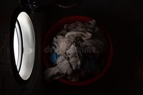 Washing Machine Glows From Inside In A Dark Laundry Room Stock Photo ... regarding