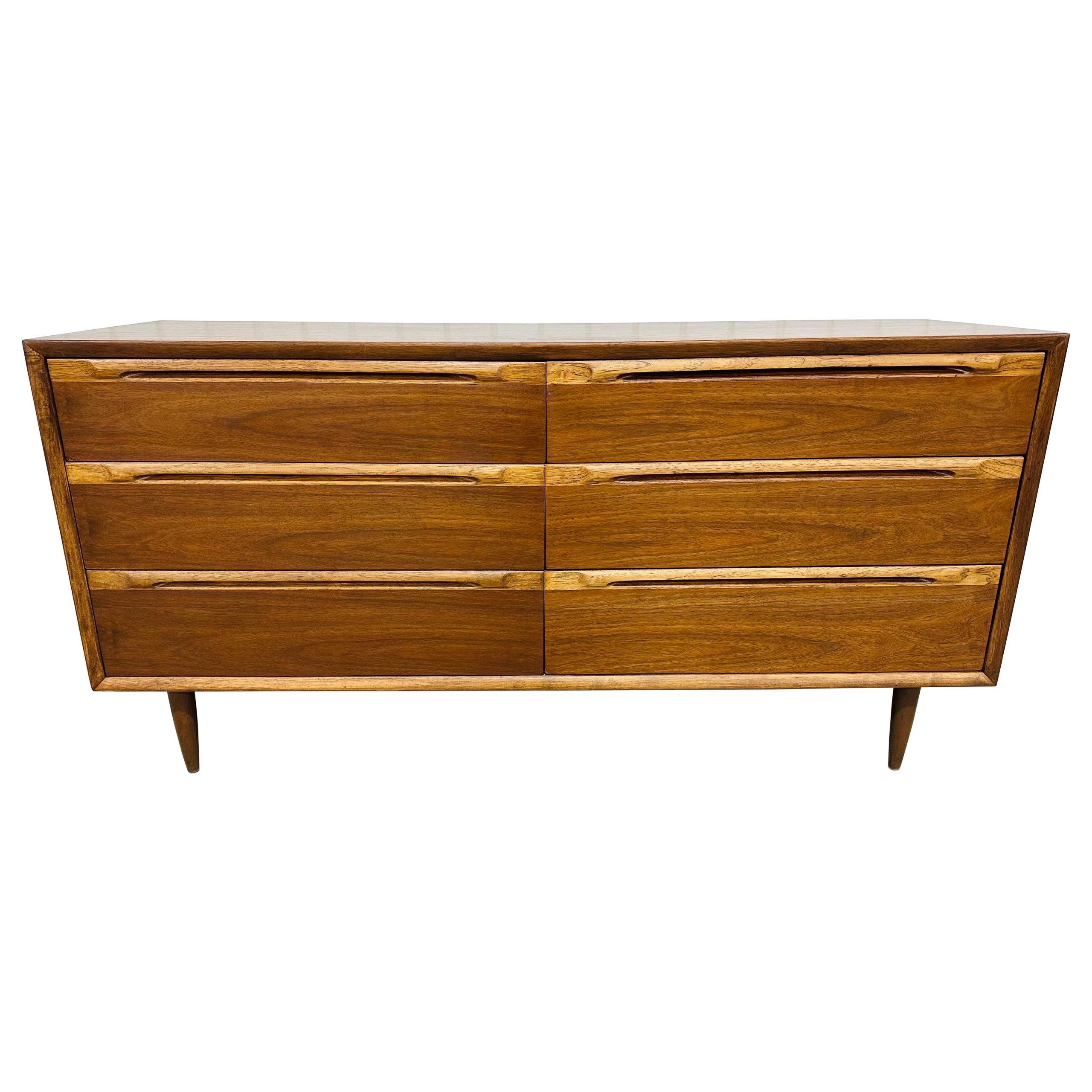 The evolution of walnut double dressers from mid-century design movement