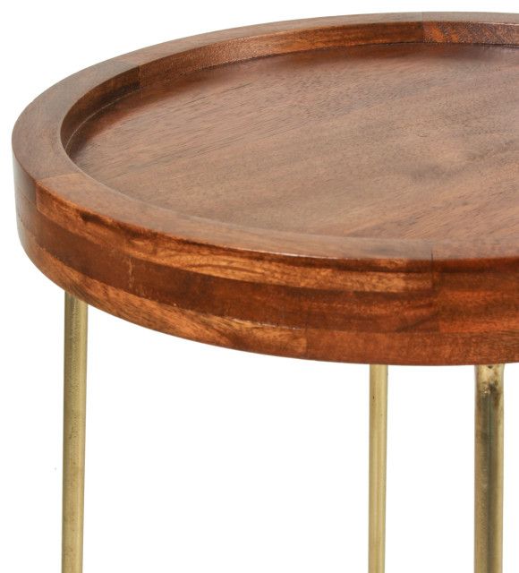 How natural wood and gold iron elements come together in East at Main’s 19-inch round accent table