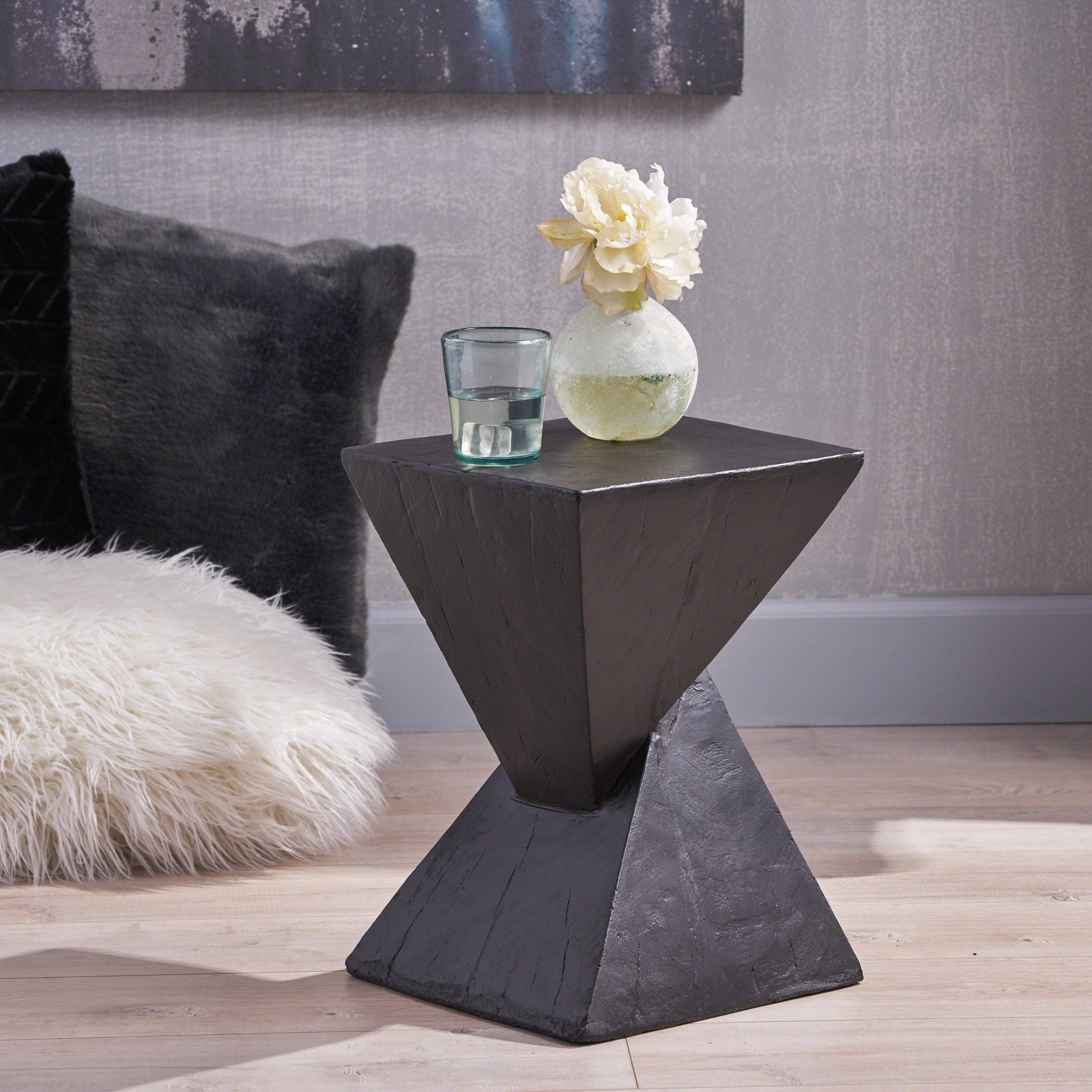 The Art and Functionality of Black Concrete Accent Tables in Home Design